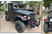 1982 Toyota Land Cruiser Black Matte Exterior w/ Beige Soft Top / Black Interior