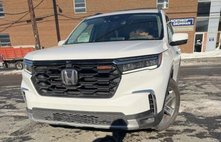 2023 Honda Pilot EX-L w/Rear Captain's Chairs